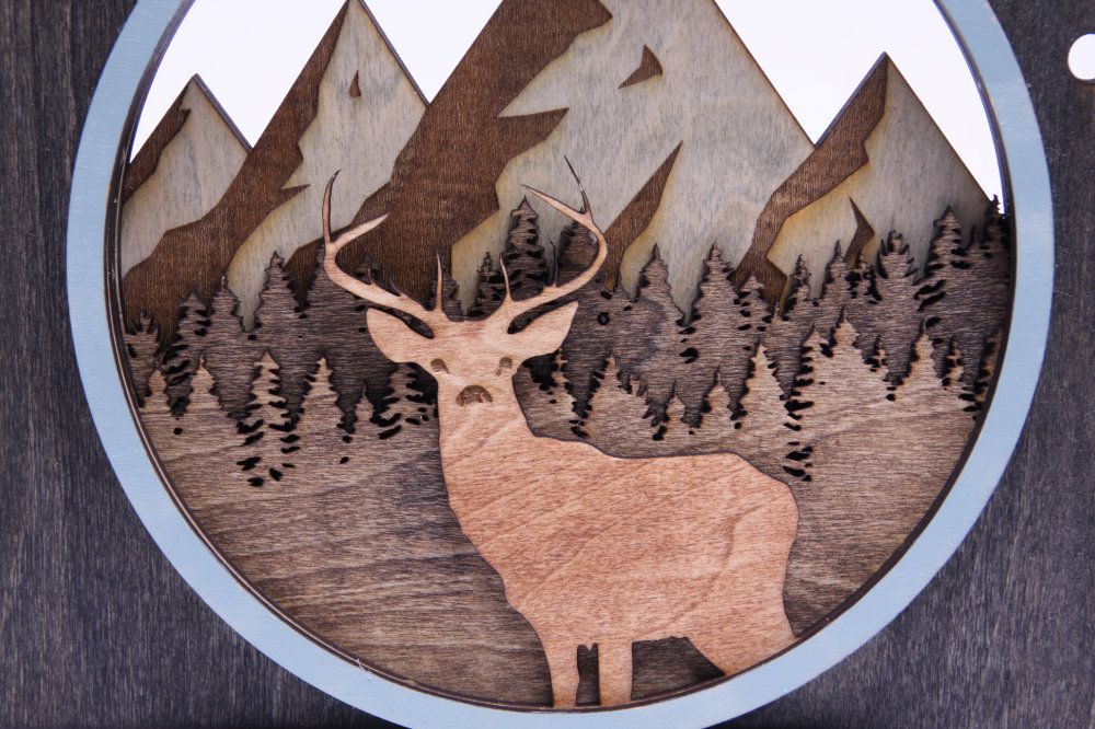 Deer on camera laser cut and engrave